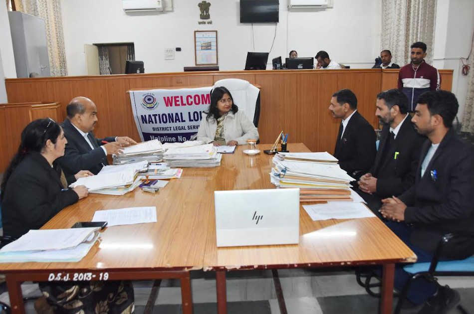 पलवल राष्ट्रीय लोक अदालत में लंबित मामलों का निपटारा